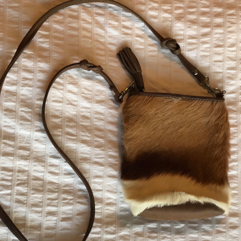 Authentic Kulu springbok crossbody bag.